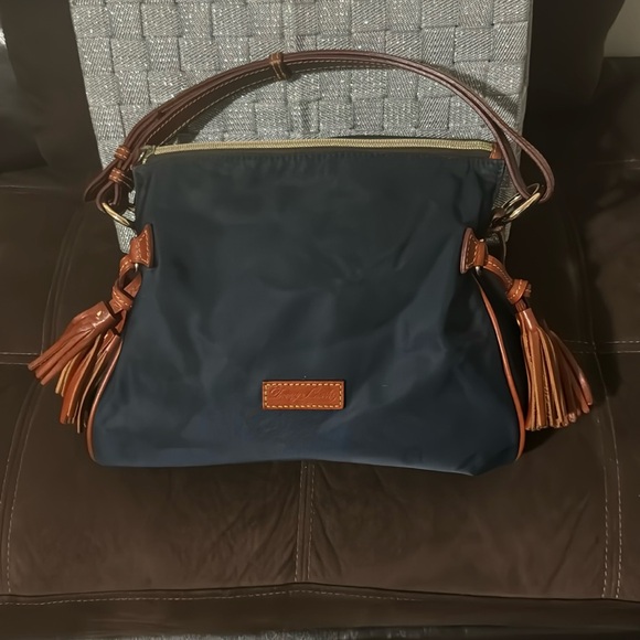 Dooney & Bourke Handbags - Dooney &Bourke Navy Blue Shoulder Bag pink inside brown leather strap & tassels